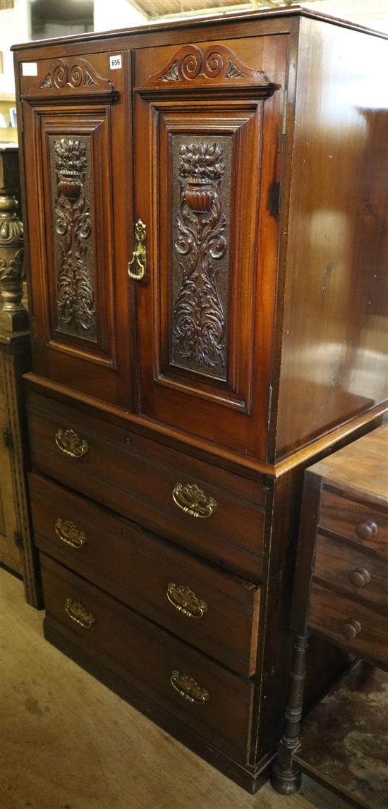 Centre section of wardrobe of carved panels